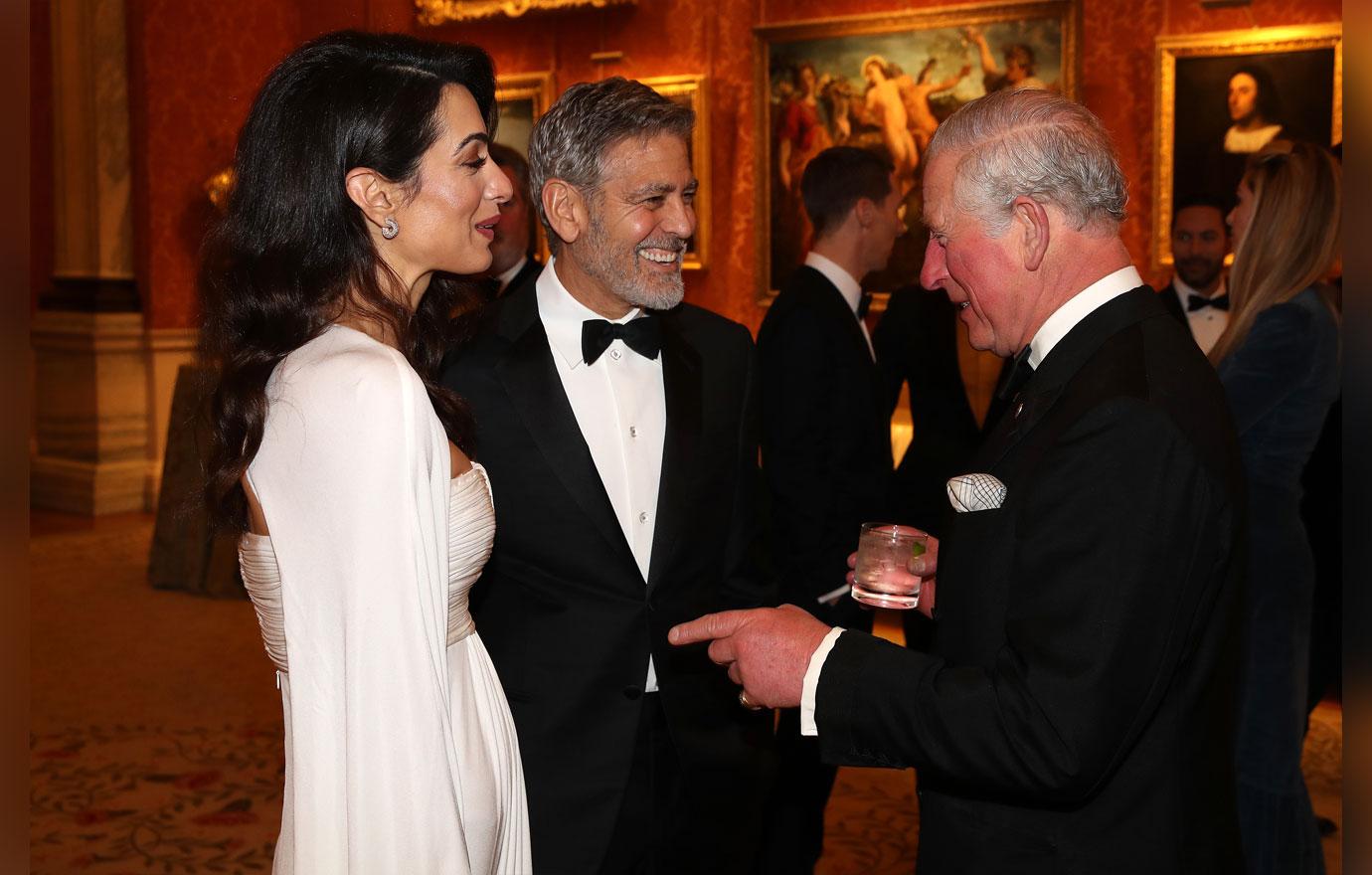 George and Amal Clooney with Prince Charles