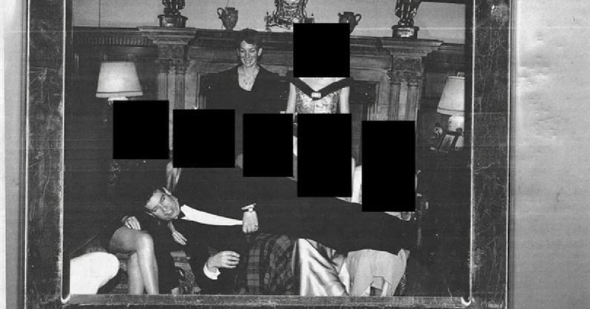 Image of Prince Andrew was pictured lying across the laps of five women alongside Ghislaine Maxwell.