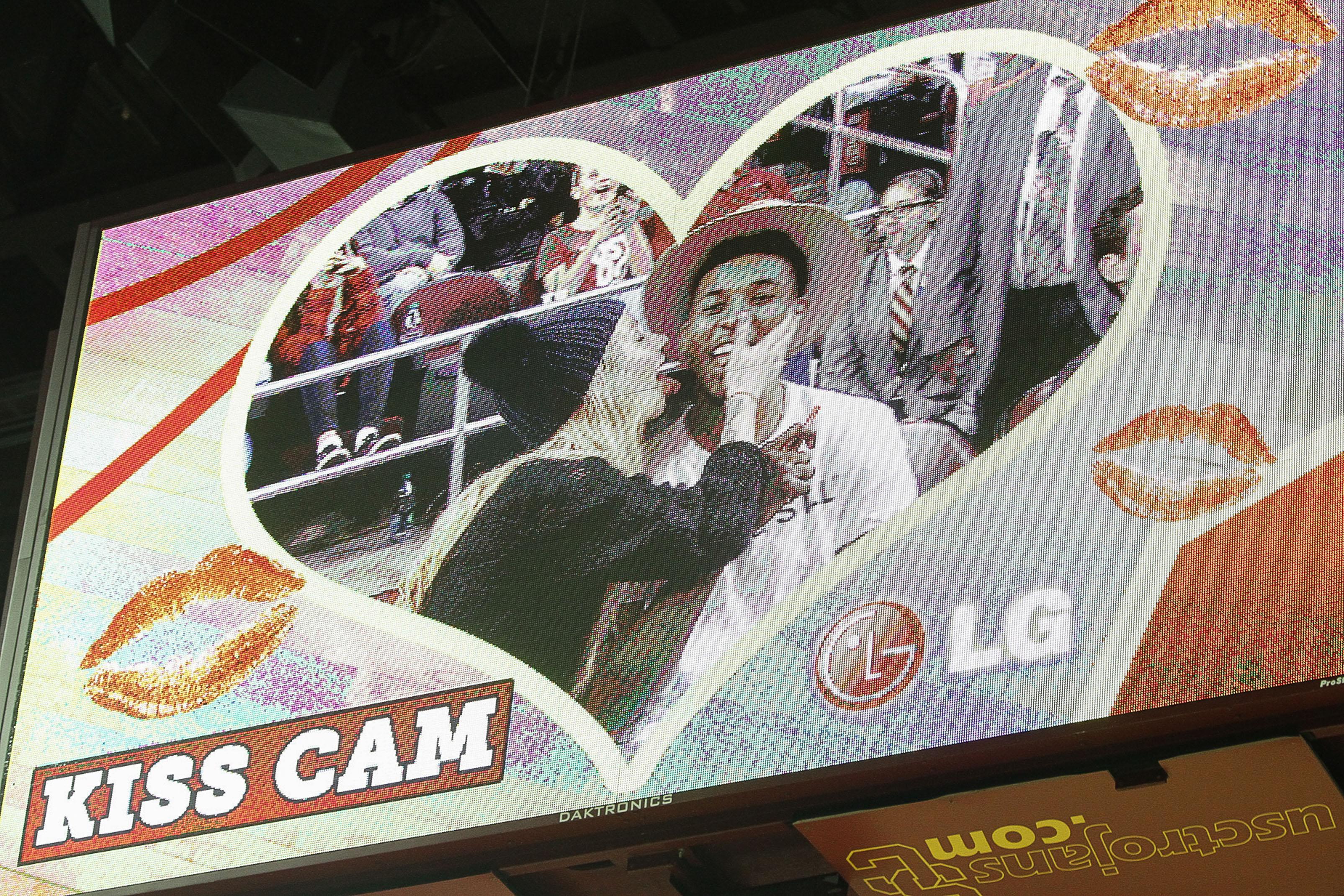 Iggy Azalea and LA Laker Nick Young caught on the 'Kiss Cam' courtside at the USC game