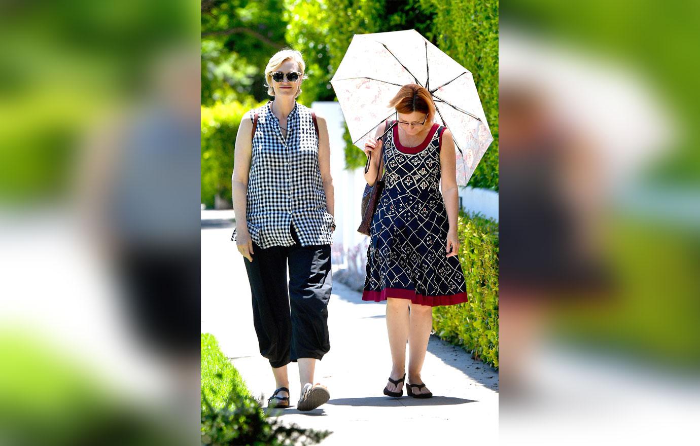 Jane lynch and partner walking