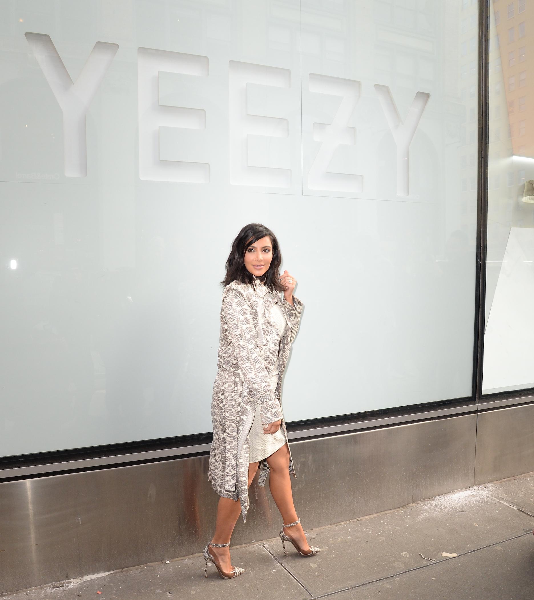 Kim Kardashian does an impromptu photo shoot outside the Adidas store in SoHo, NY