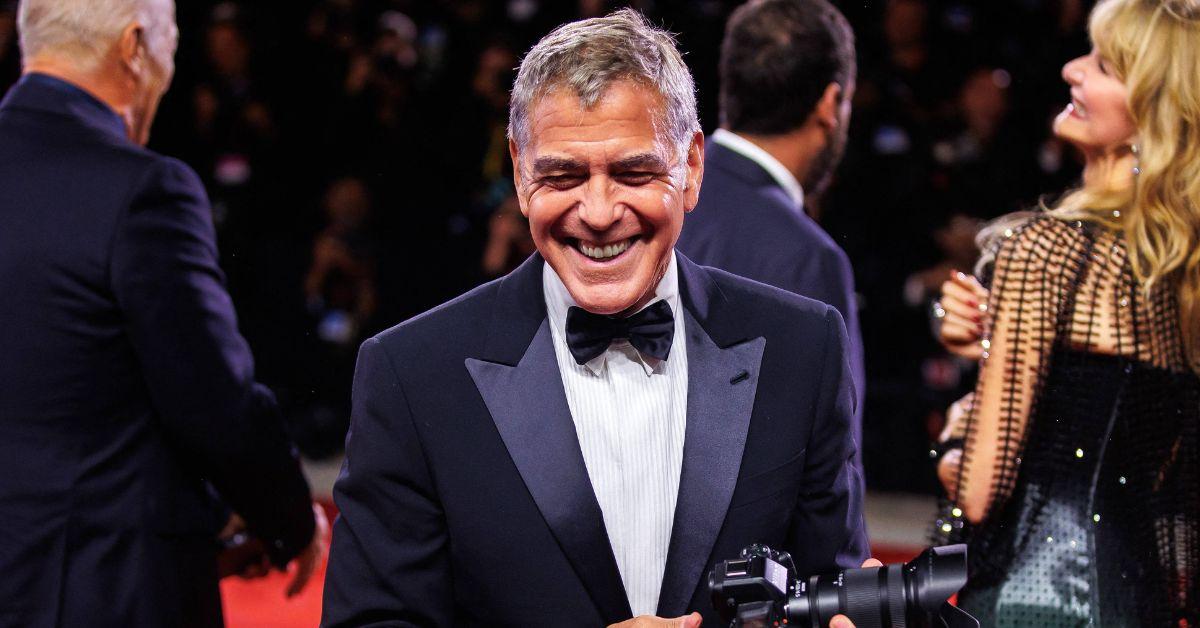 image of George Clooney said he 'enjoys driving' his 8-year-old twins to school.
