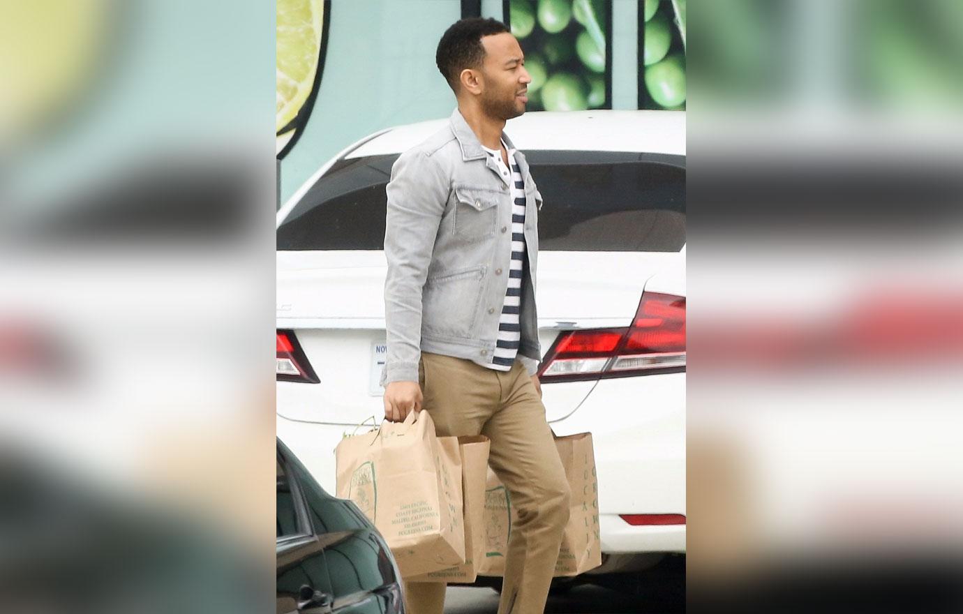 *EXCLUSIVE* Chrissy Teigen and John Legend shop at PC Greens with a cranky Luna