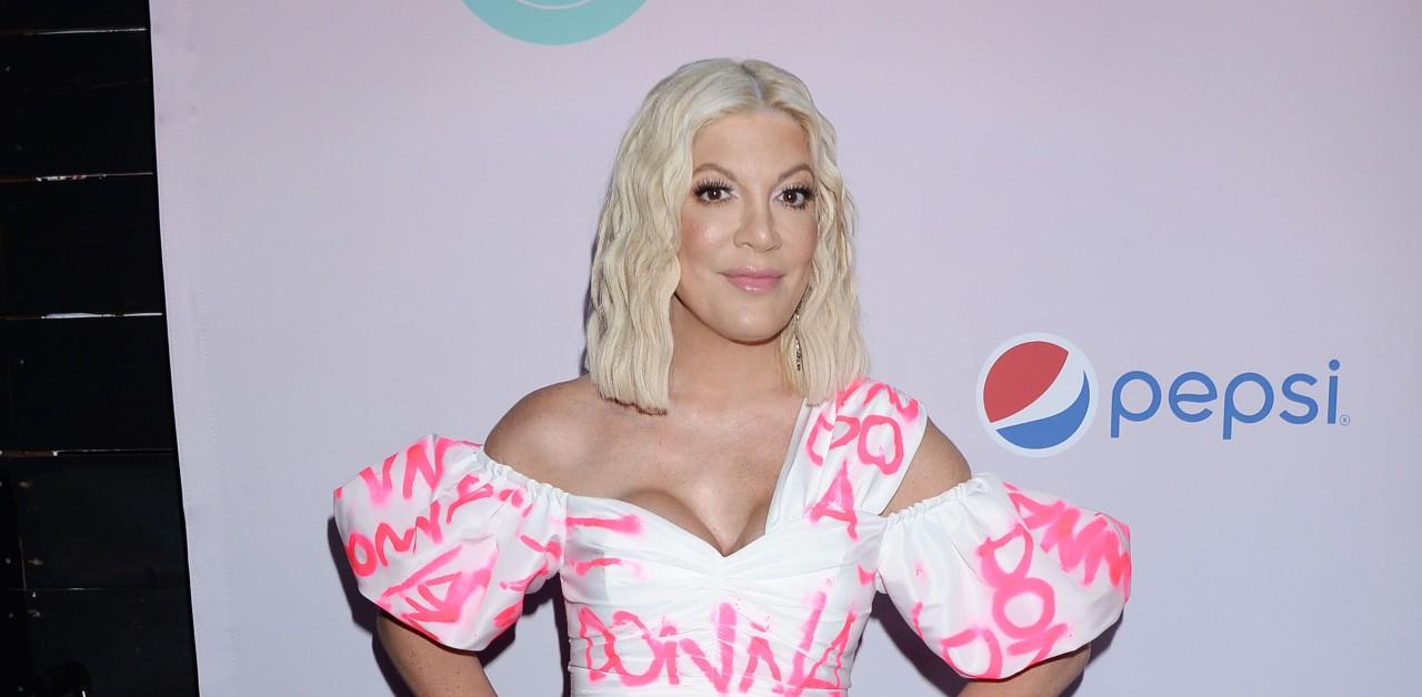 Tori Spelling, 48, reveals she's getting 'bigger' breast implants than size  D's & swears 'they'll actually look smaller