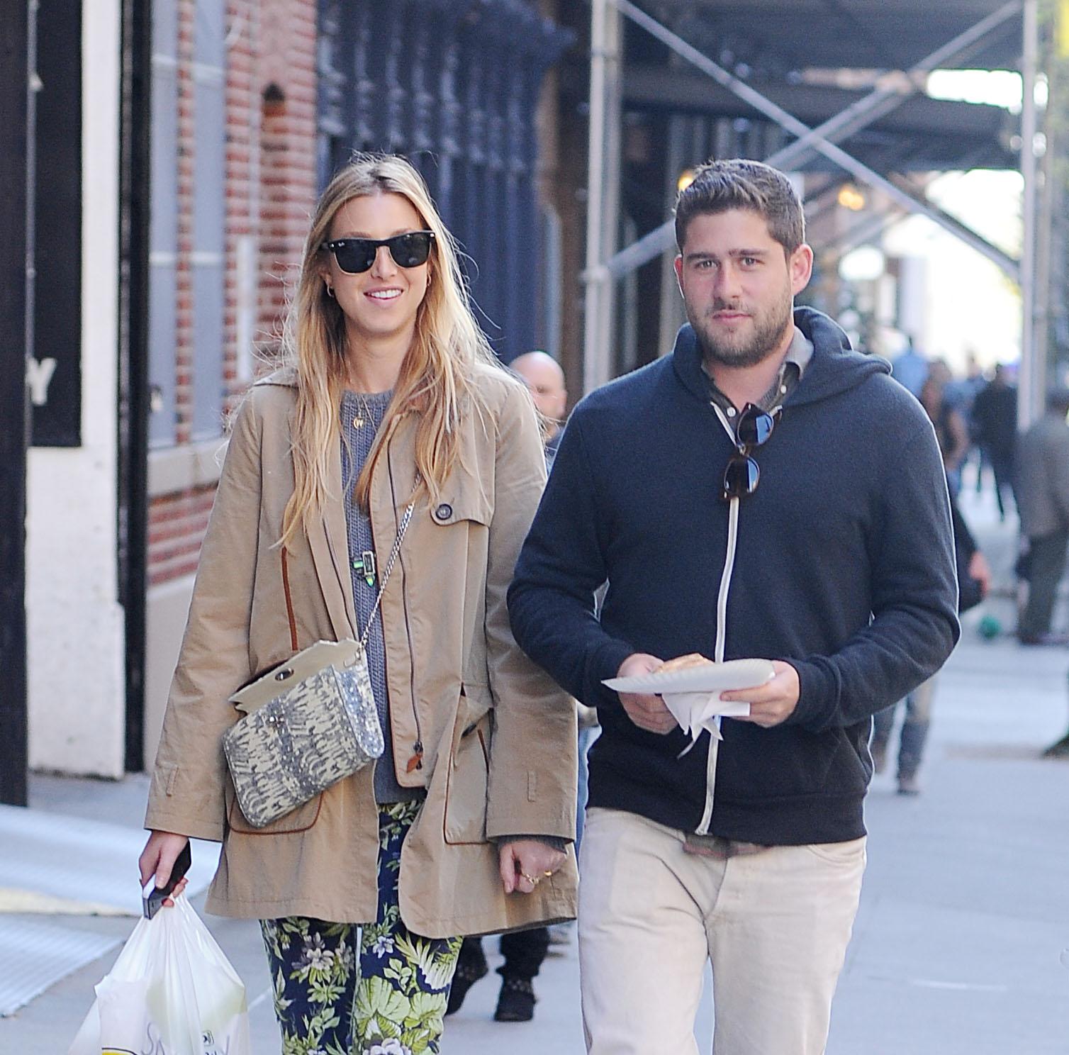 Whitney Port and reported boyfriend Tim Rosenman stroll through Tribeca after picking up some Pizza at local shop