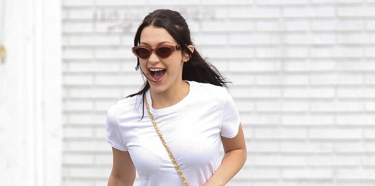 *EXCLUSIVE* Bella Hadid makes a run for it after lunch with her brother Anwar