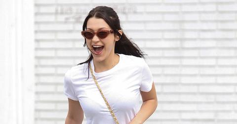 *EXCLUSIVE* Bella Hadid makes a run for it after lunch with her brother Anwar