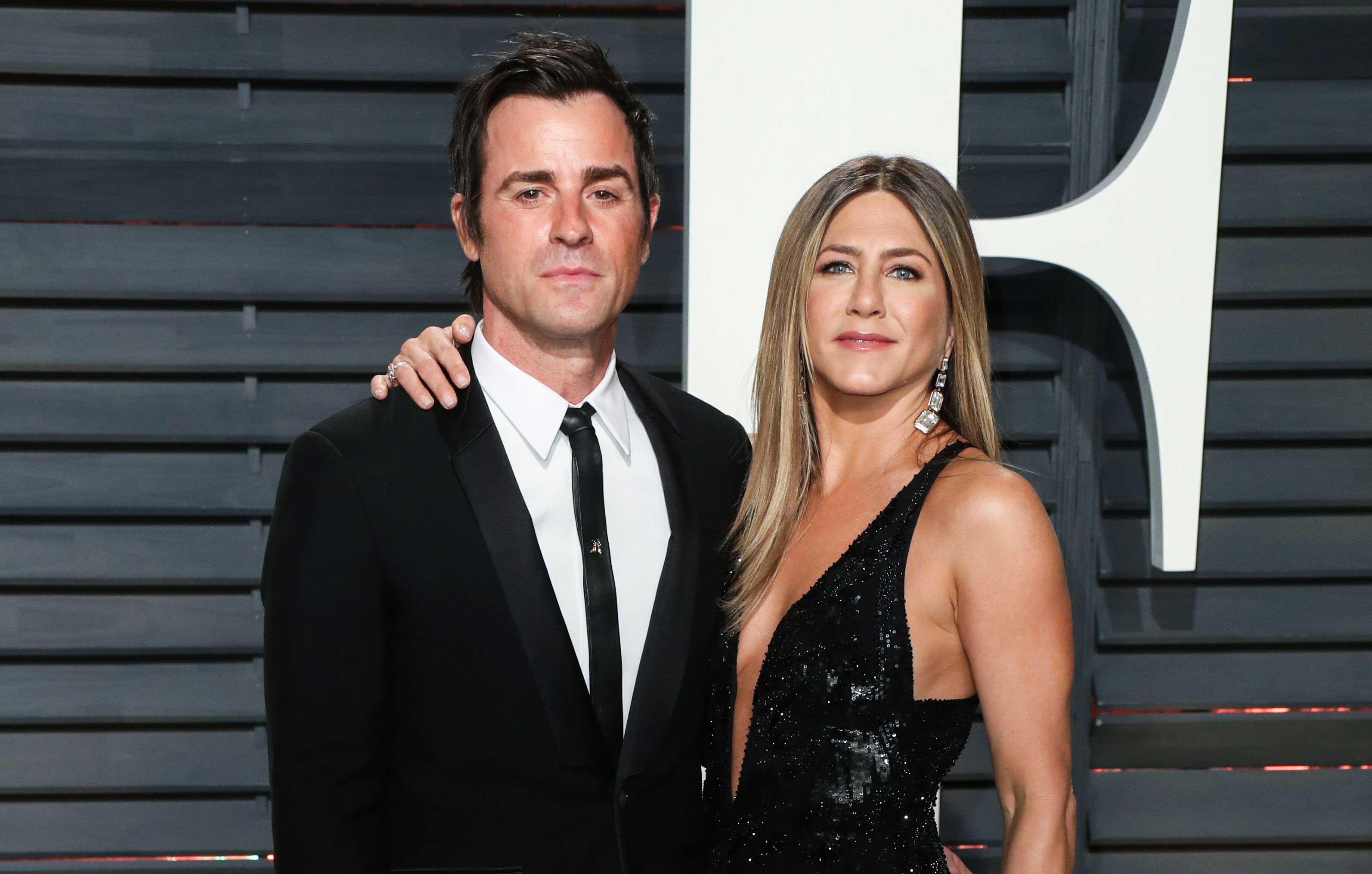 US actor Justin Theroux, left and his wife US actress Jennifer