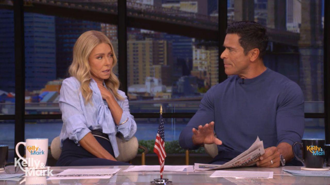 Image of Mark Consuelos and a 'Live' crew member discussed how 'hard' the marathon is. 
