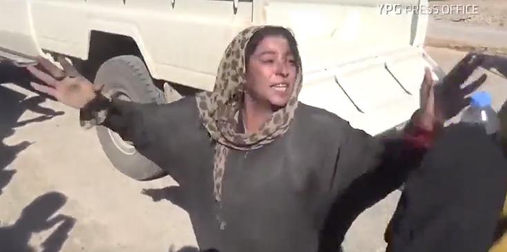 Women tears off burqa isis rescued feaature