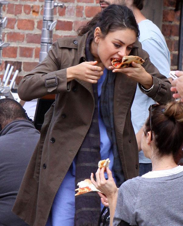 Mila Kunis Eating