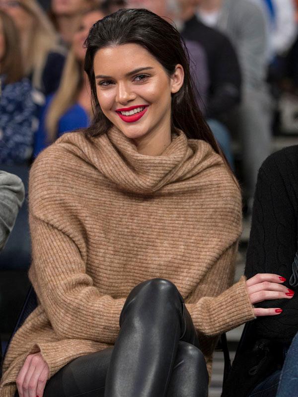 Kendall Jenner sits court side during NY Knicks game at Madison Square Garden with with Hailey Baldwin and Gigi Hadid