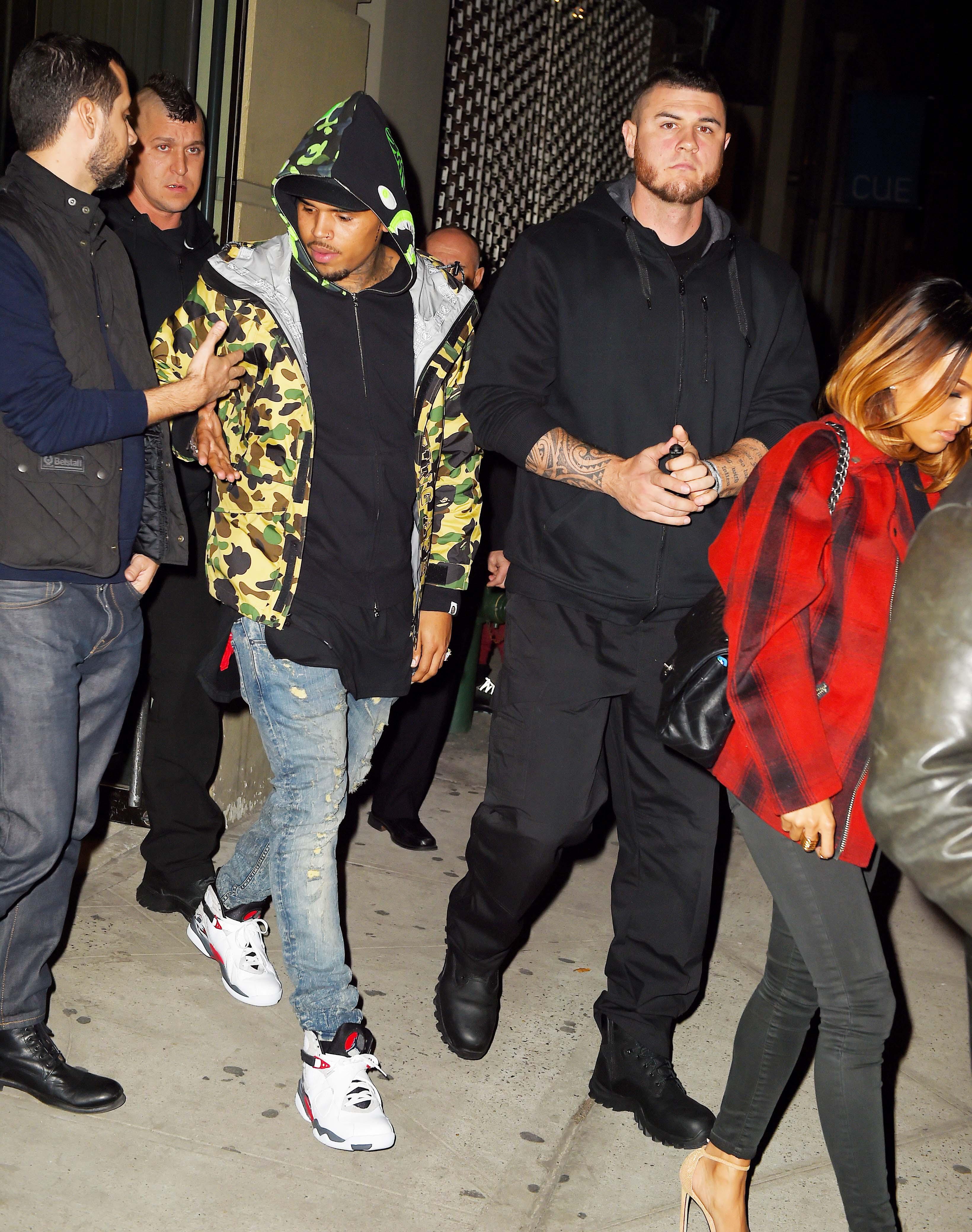 Chris Brown and girlfriend Karrueche Tran seen leaving an art gallery in Chelsea