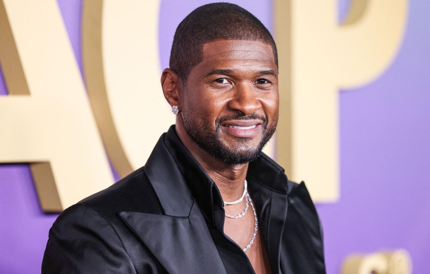 usher reacts justin bieber father son jack fatherhood