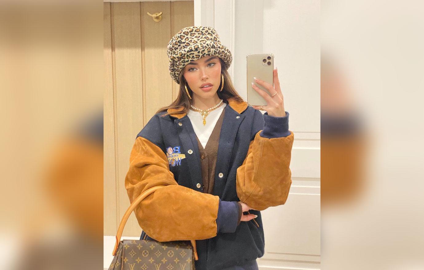 Madison Beer Wears Trendy Bucket Hat and Varsity Jacket