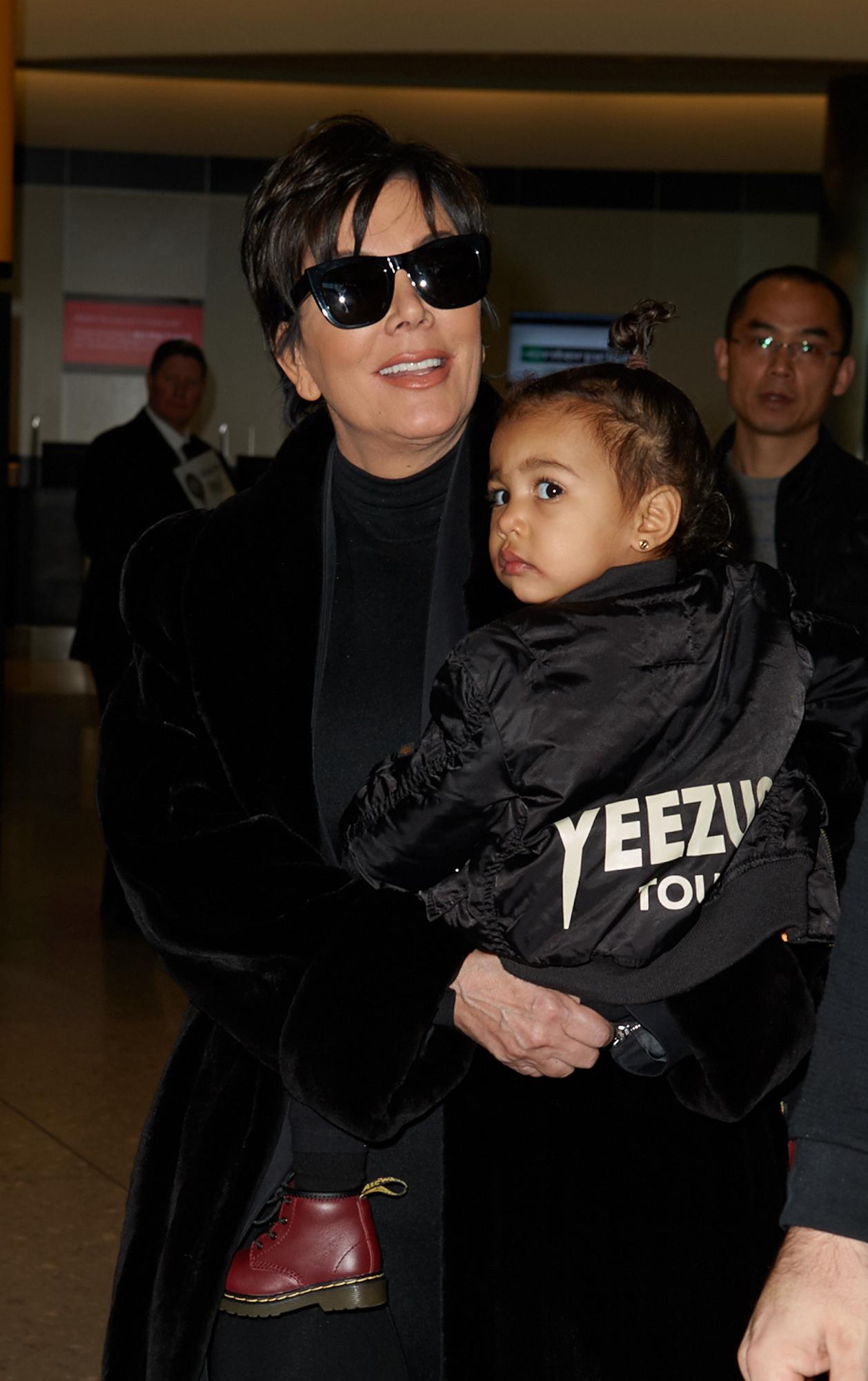 Kris Jenner and baby North West at Heathrow Airport