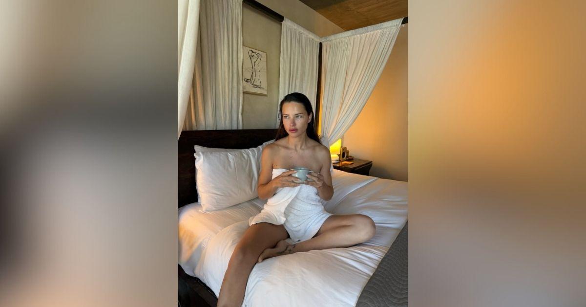 image of Adriana Lima shared a photo wearing only a towel.