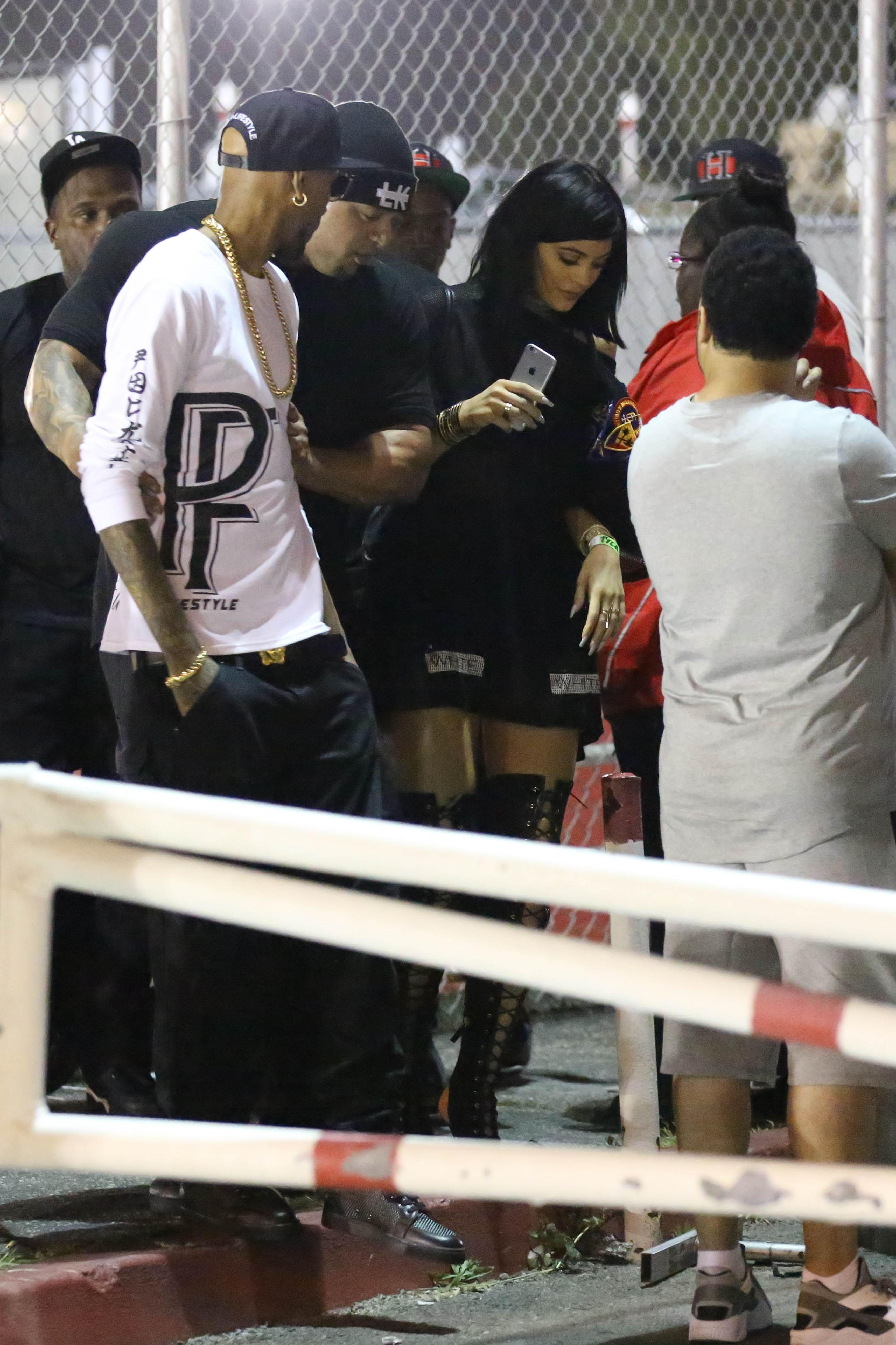 Kylie Jenner accompanies Tyga to his concert with Chris Brown and Trey Songz