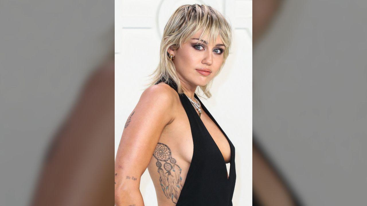 Image of Miley Cyrus reflected on the 'brick-by-brick' path Dolly Parton helped build.