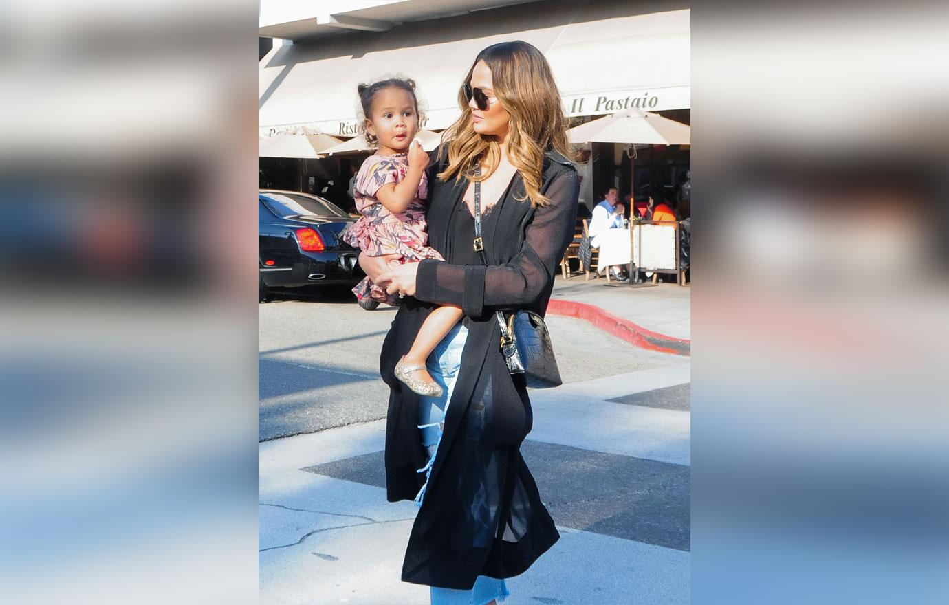 Chrissy Teigen goes shopping with daughter Luna