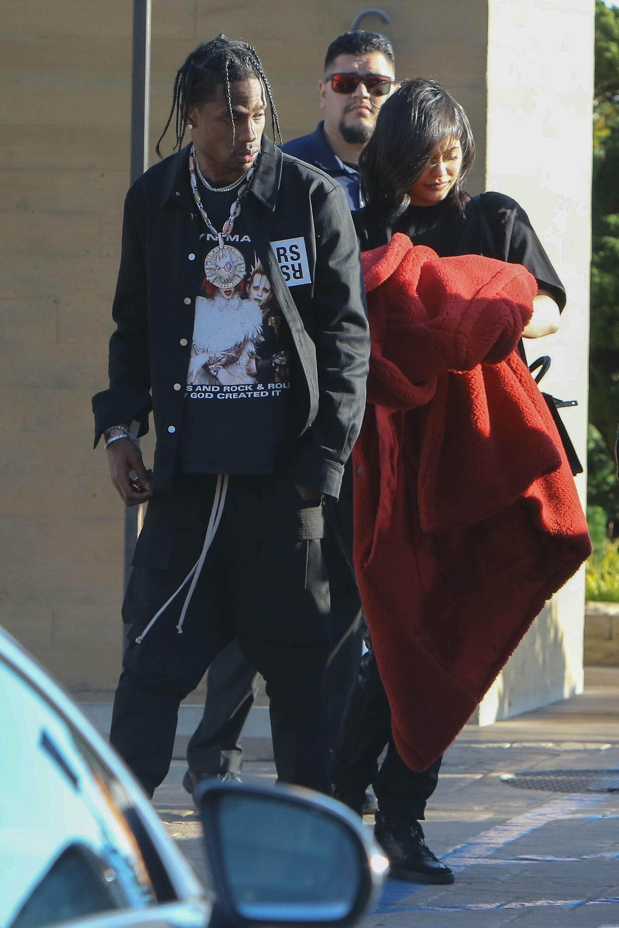 New parents Kylie Jenner and Travis Scott leave after lunch at Nobu