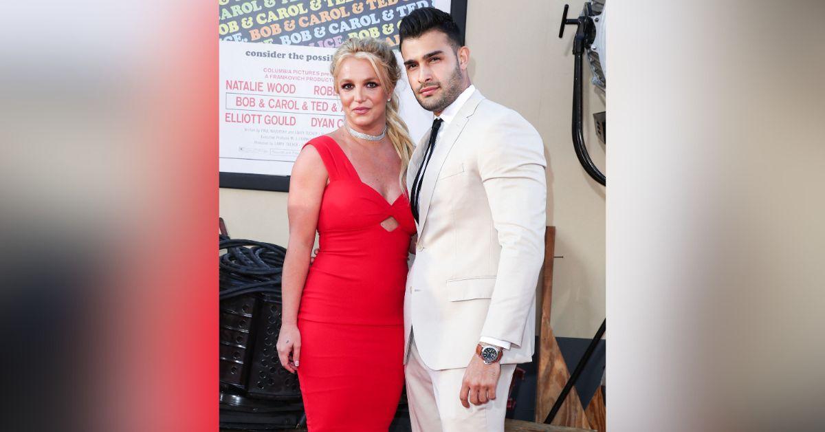 britney spears presses cleavage together in provocative photos