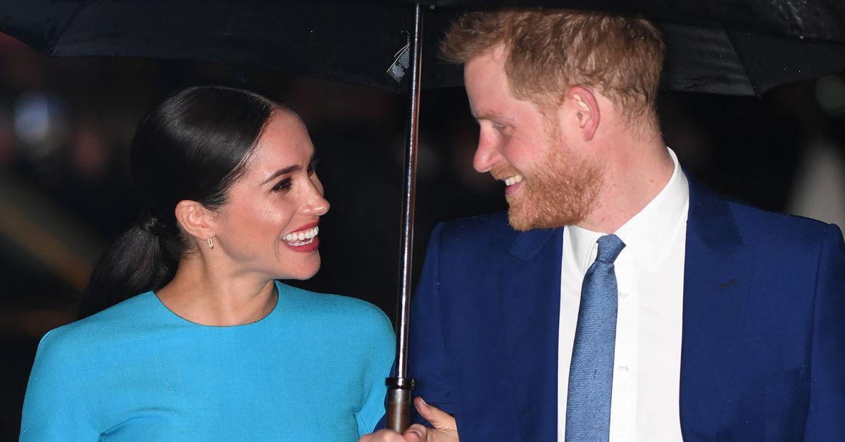 prince harry and meghan markle smiling