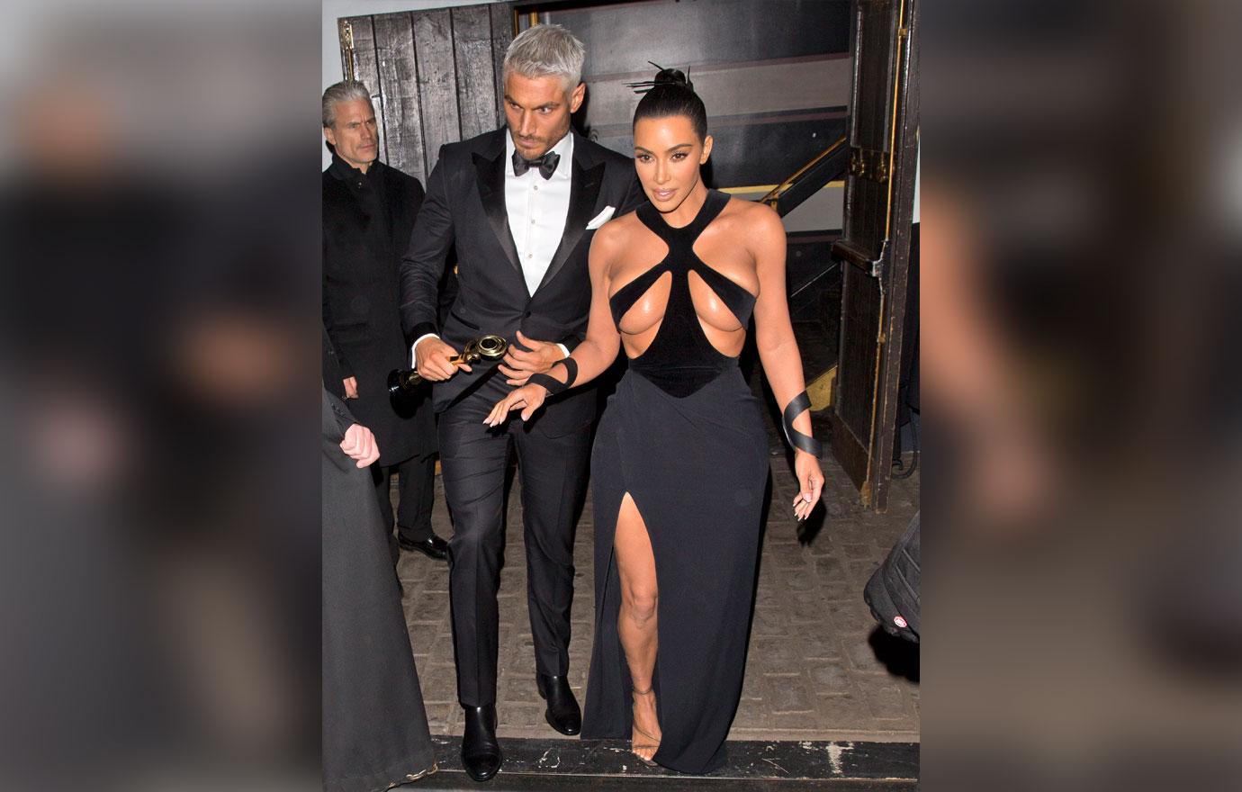 Kim Kardashian wears a &#8216;Barely There&#8217; dress as she was seen leaving  &#8216;The Avalon&#8217; in Hollywood with her British Hair Stylist Chris Appleton who was looking sharp in a Tuxedo and holding a Gold award