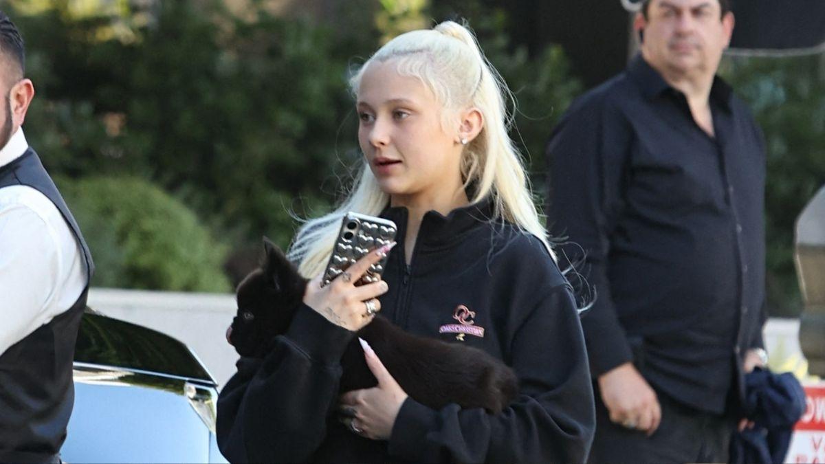 image of Her bold bikini featured neon trim and eye-catching patches.