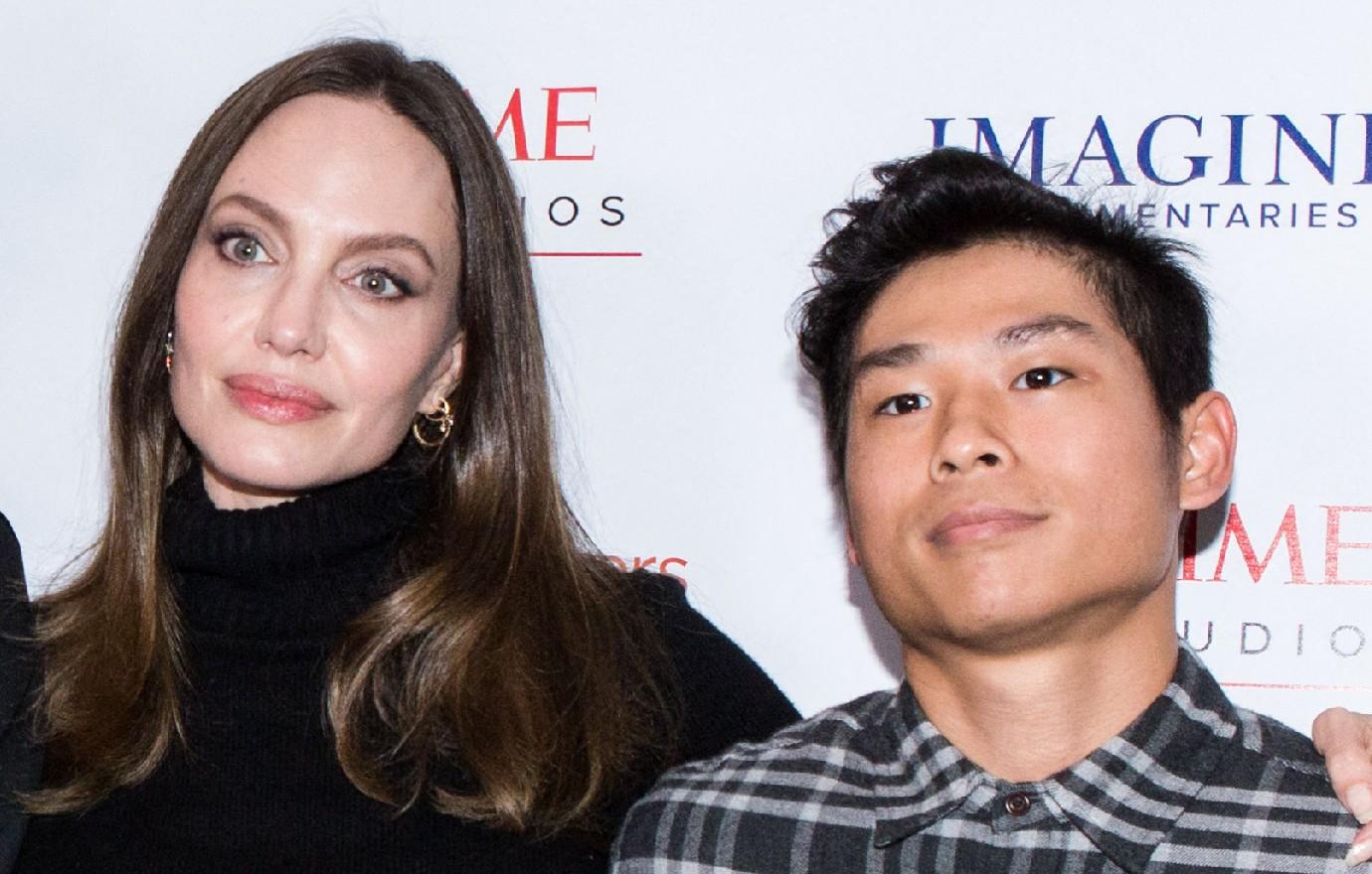 angelina jolie enjoys sushi dinner son pax legal drama ex brad pitt