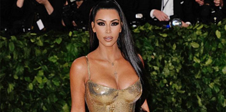 Kim kardashian explains kanye west met gala absence