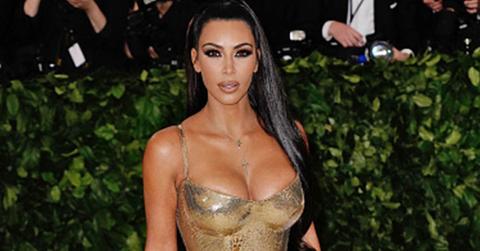 Kim kardashian explains kanye west met gala absence