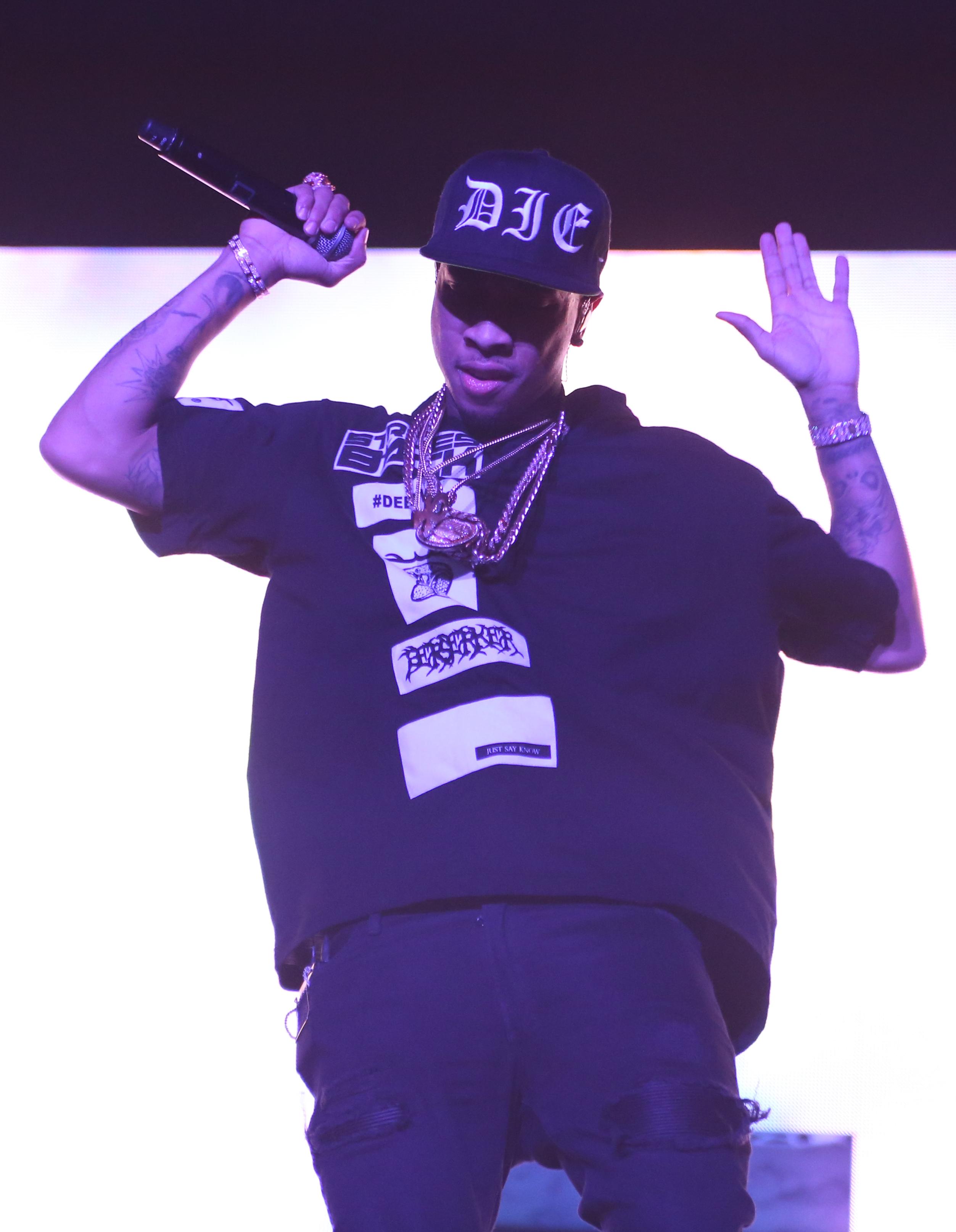 Tyga performs on stage on the &#8220;Between the Sheets&#8221; tour at the Los Angeles Forum in Inglewood, CA