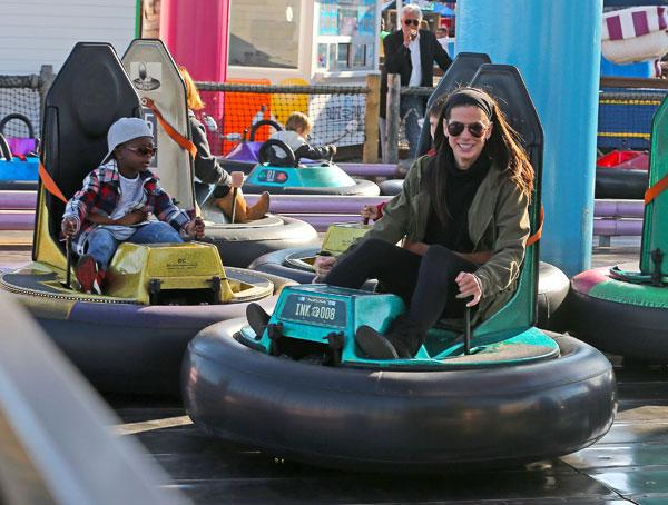 sandra bullock son louis bumper car fun