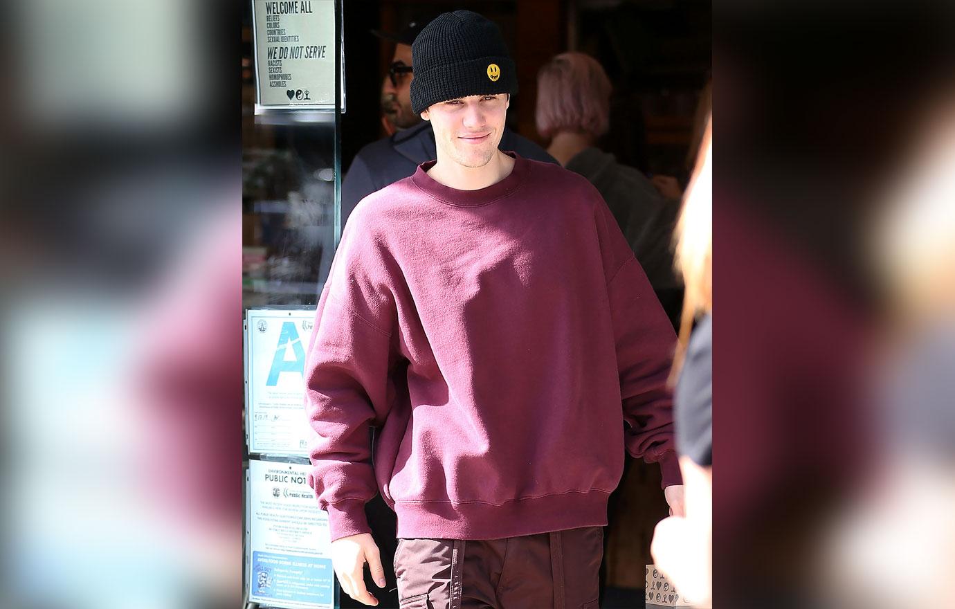 Justin Bieber In Maroon Sweatshirt