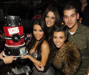 2010__10__Kim Kardashian with cake Khloe Kourtney Rob Kardashian at TAO LV with FALLOUT NEW VEGAS 300×261.jpg