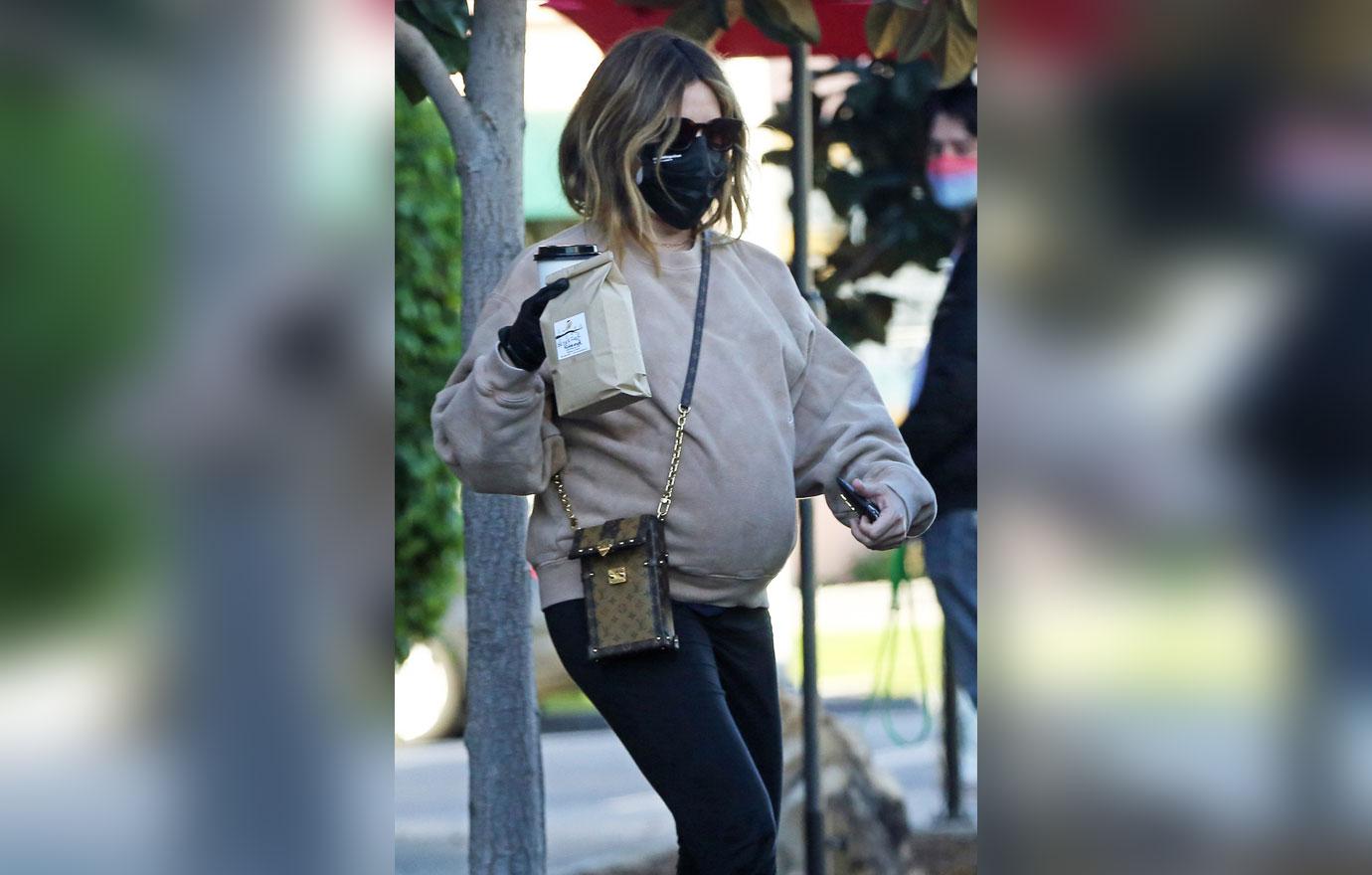 pregnant ashley tisdale keeps it safe grabbing lunch coffee