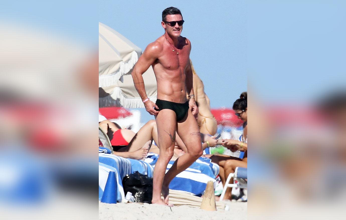 luke evans speedo photos miami beach mystery man