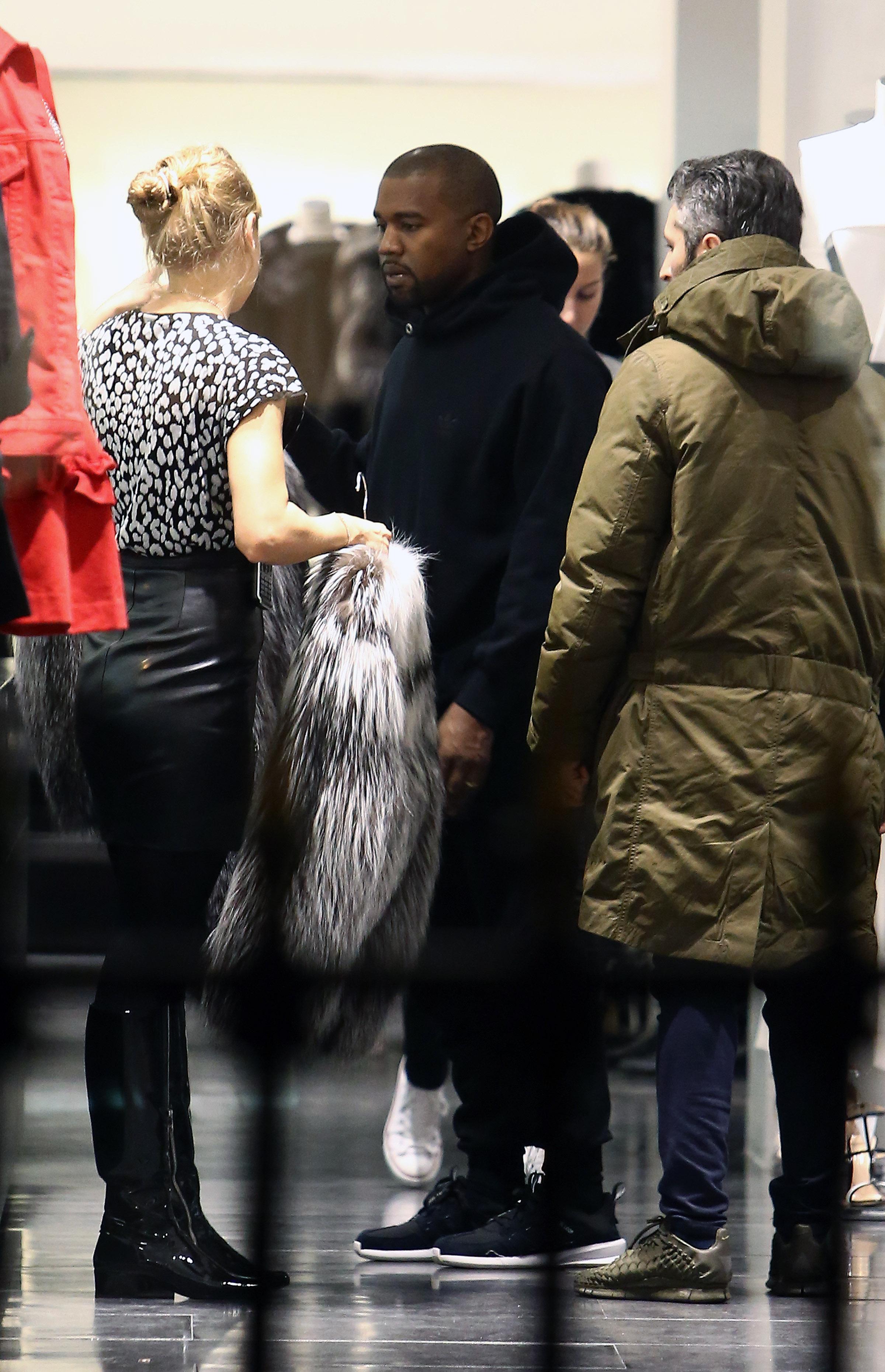 American producer and rapper Kanye West goes shopping at Montaigne market