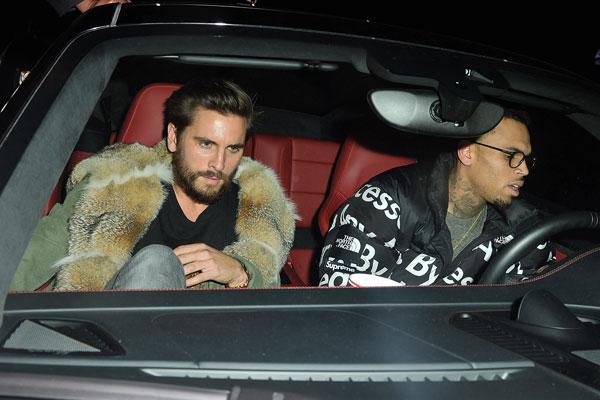 Scott disick partying chris brown