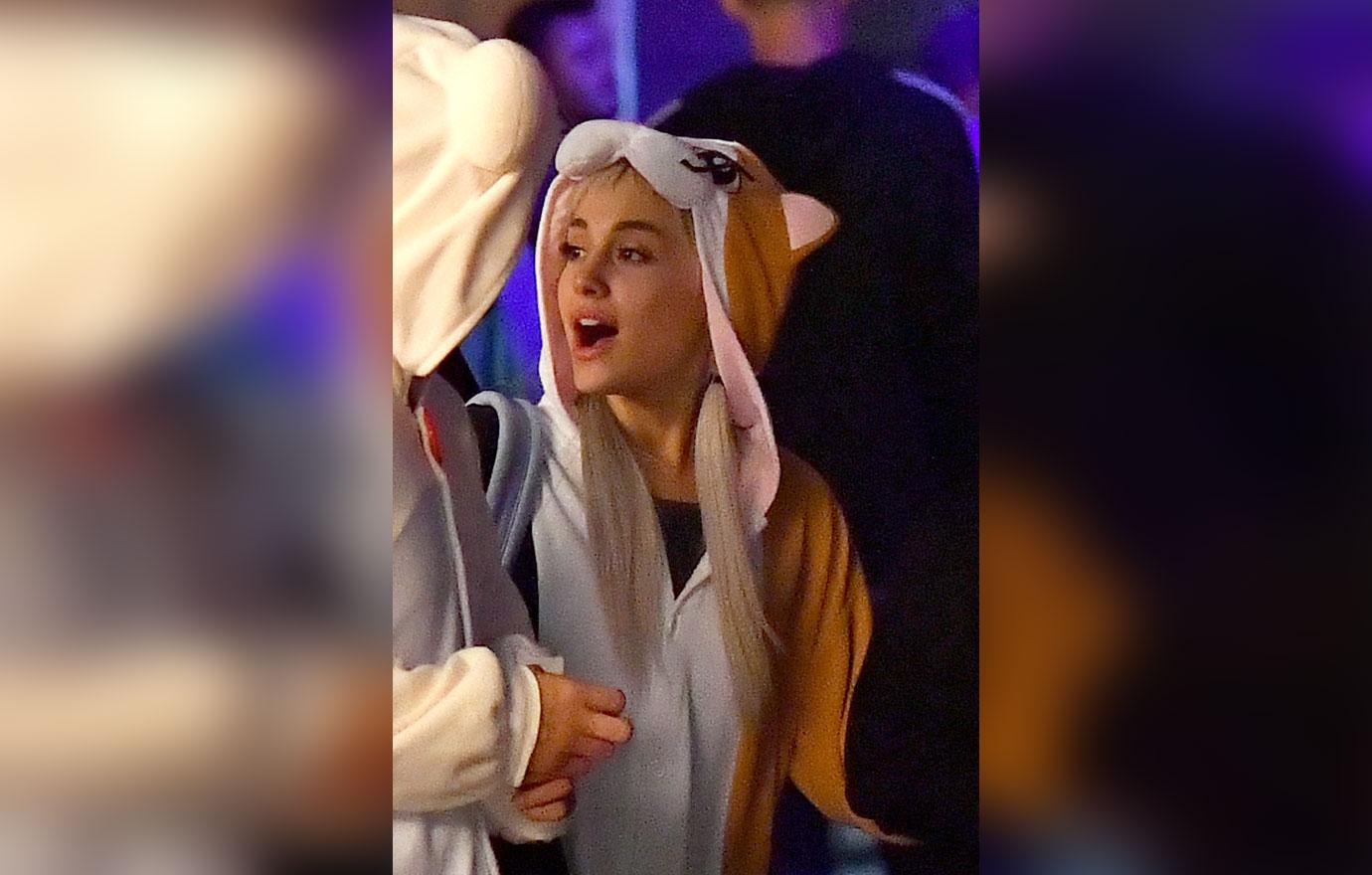 EXCLUSIVE: Ariana Grande holds hands with her mother at Knotts Scary Farm in Buena Park