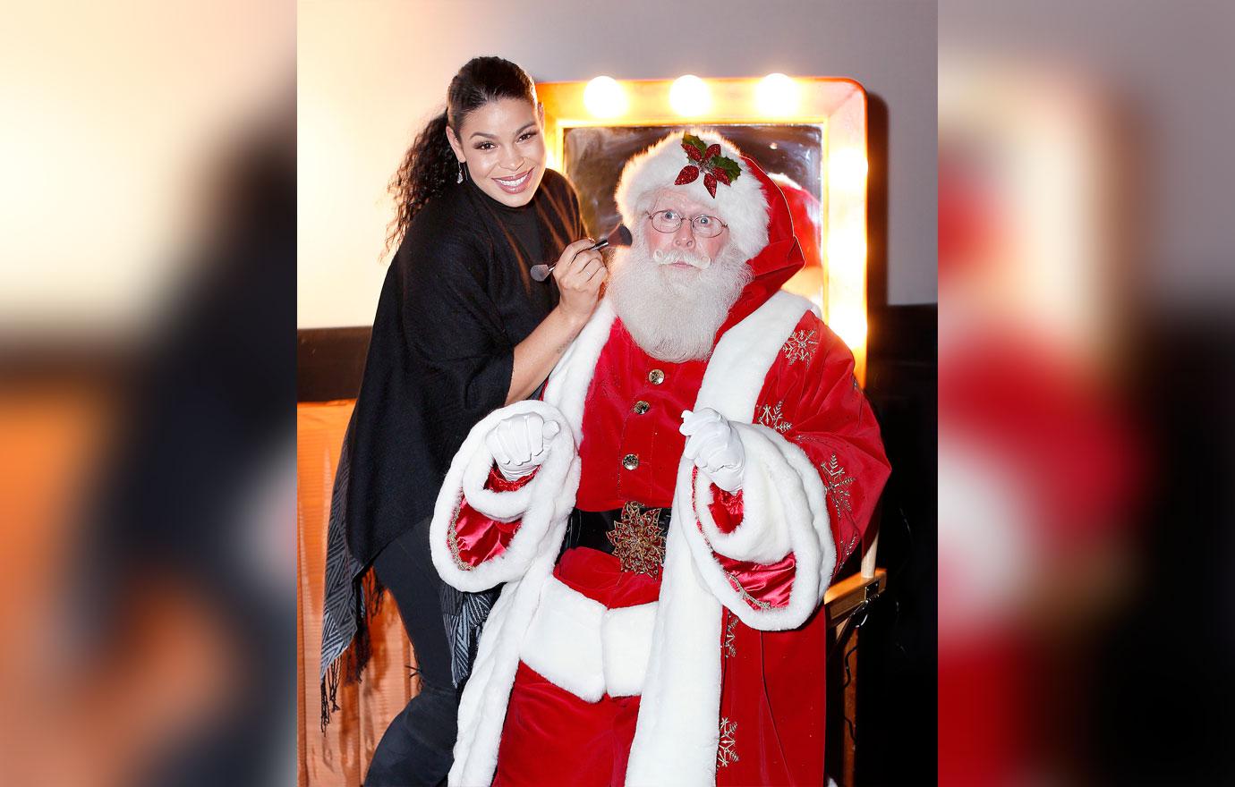 **EXCLUSIVE**  Photo Credit: MOVI Inc.    Date: November 12th 2017Jordin Sparks applies some finishing touches to Santa as he stops by her dressing room before her performance at The Grove Christmas tree lighting ceremony in Los Angeles,CA.