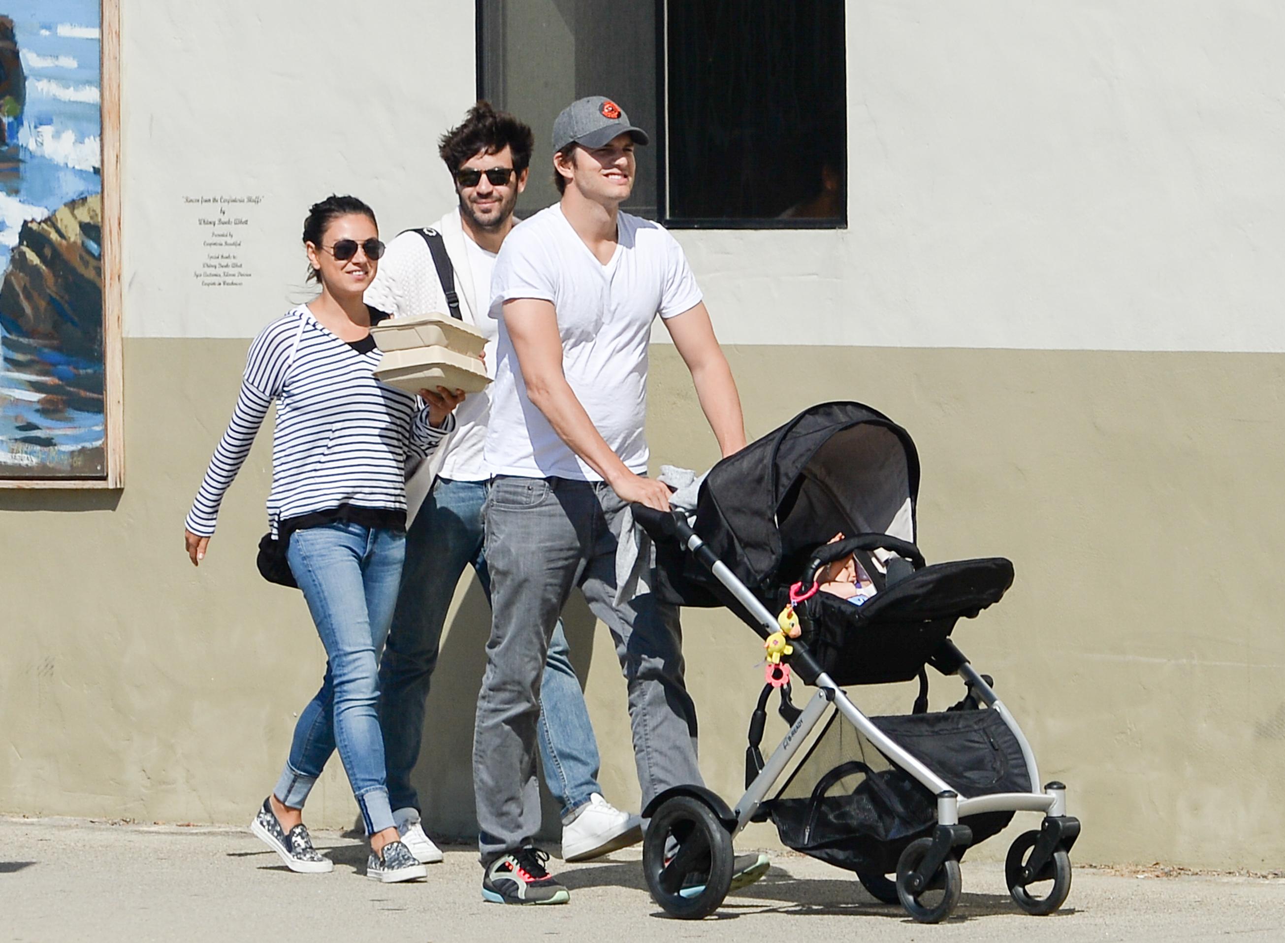 EXCLUSIVE: ** PREMIUM RATES APPLY** Mila Kunis and Ashton Kutcher take Wyatt to lunch in Carpinteria