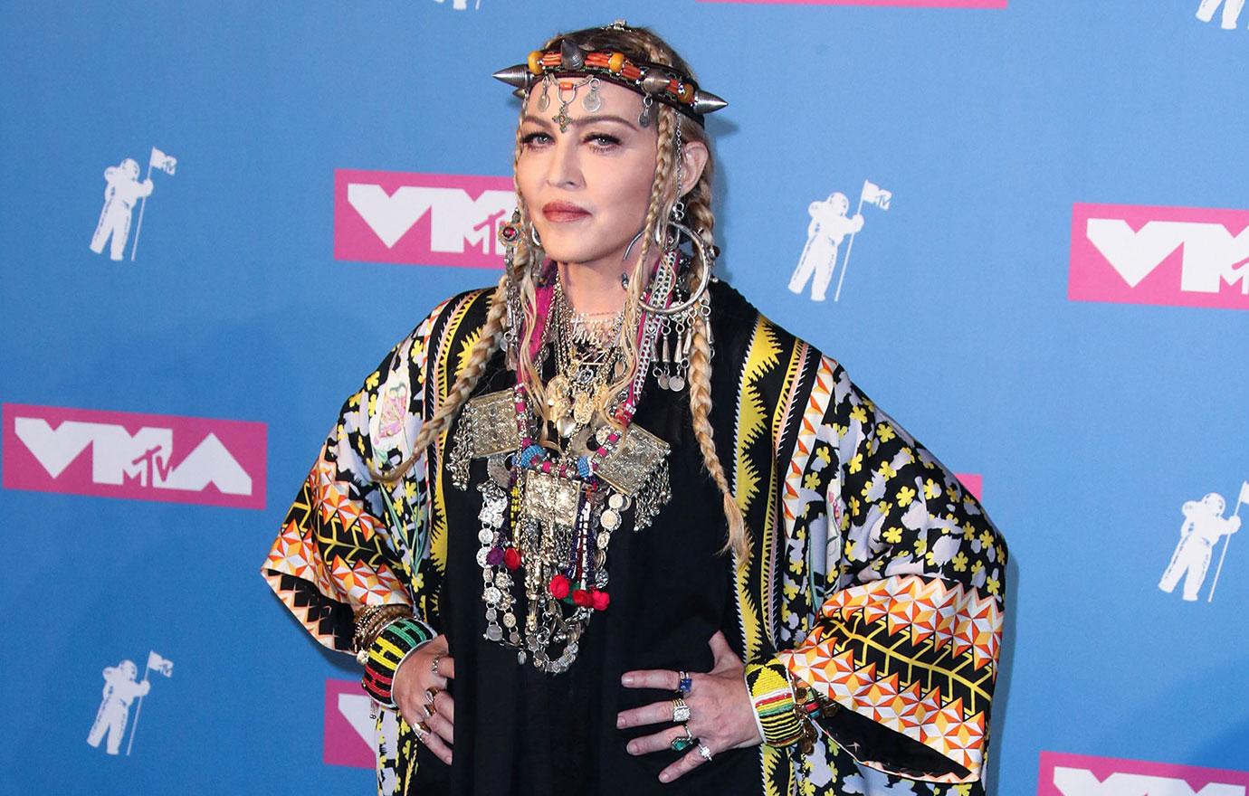 madonna defends nude nft giving birth