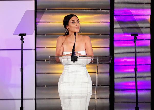 Kim kardashian wears tight white dress impact awards 04