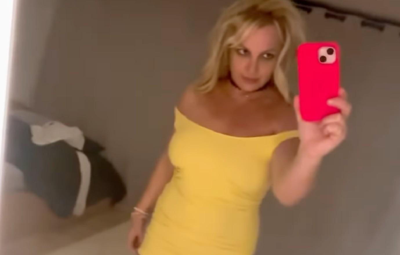 britney spears stuns models risque ensembles dressing room watch