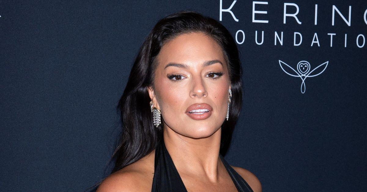 ashley graham spills out black dress  golden globes red carpet