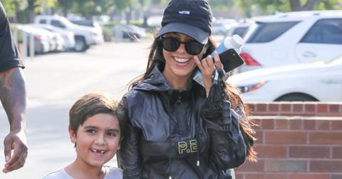 Kourtney Kardashian is all smiles as she leaves her sons art class