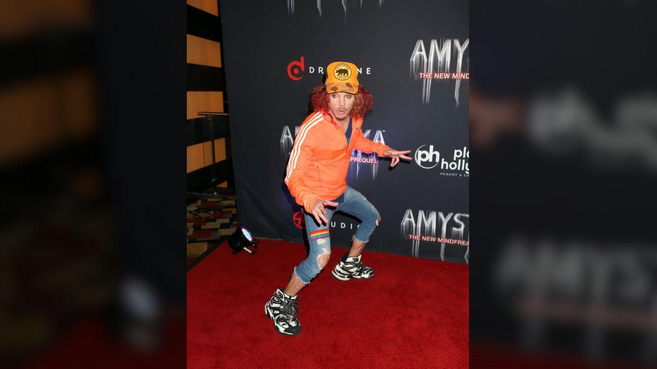 Photo of Carrot Top's accuser claimed that the comedian told him that he had 'more to lose' than him.