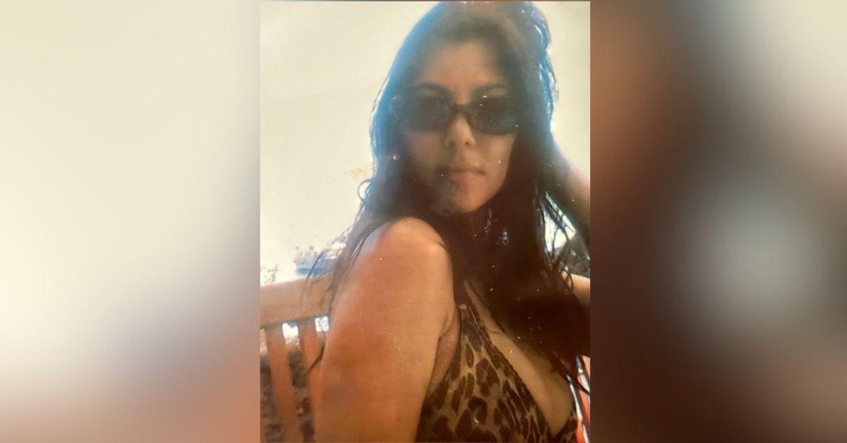image of The reality star wore a plunging leopard bikini on a luxury boat.